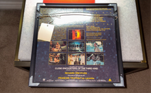 Load image into Gallery viewer, USED Vintage Collectors Item Original Motion Picture Soundtrack CLOSE ENCOUNTERS OF THE THIRD KIND VINYL includes Metal Black Frame with Glass
